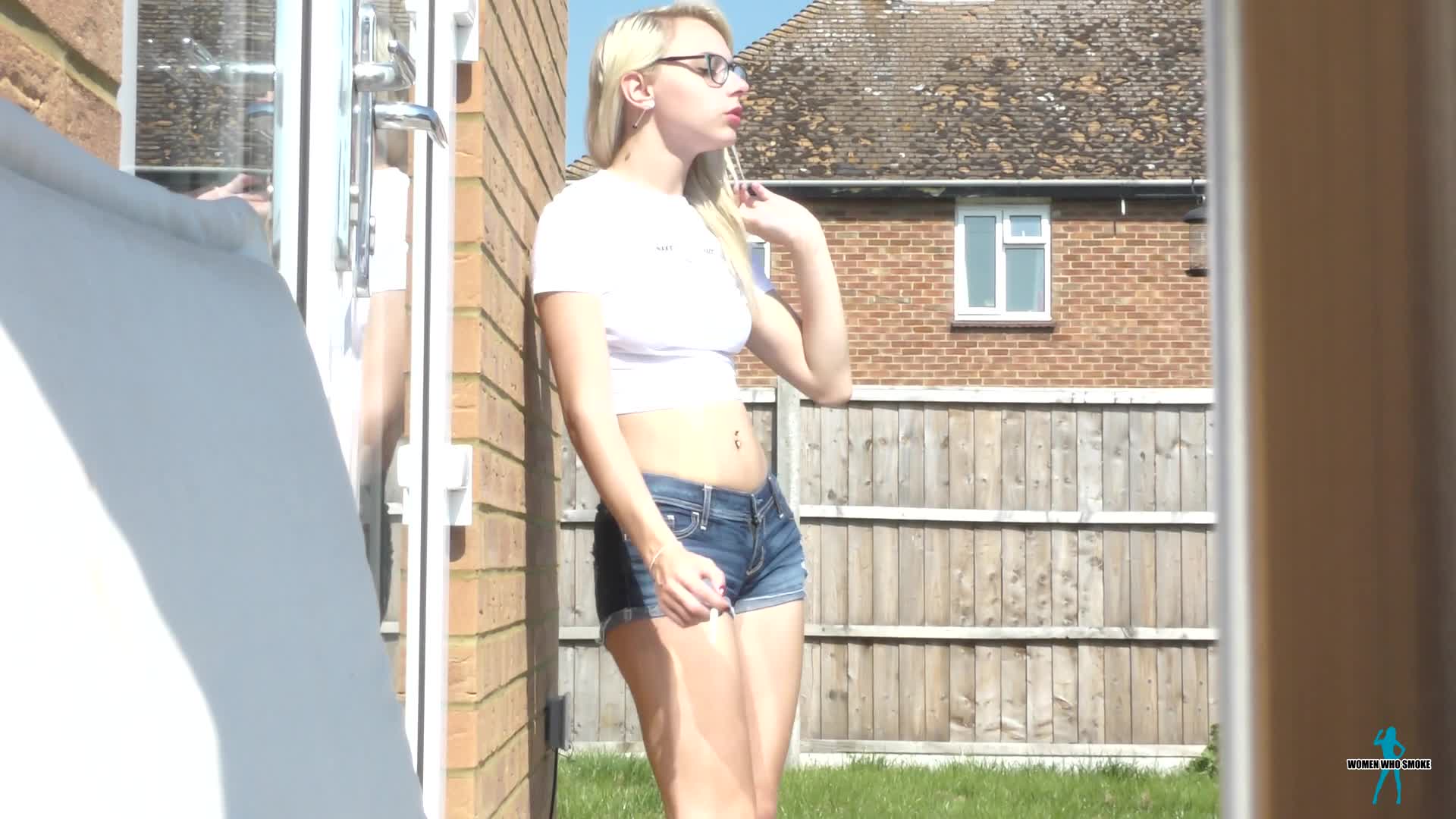 You offer Chloe Toy a lighter and watch her smoking a new packet of cigarettes WomenWhoSmoke