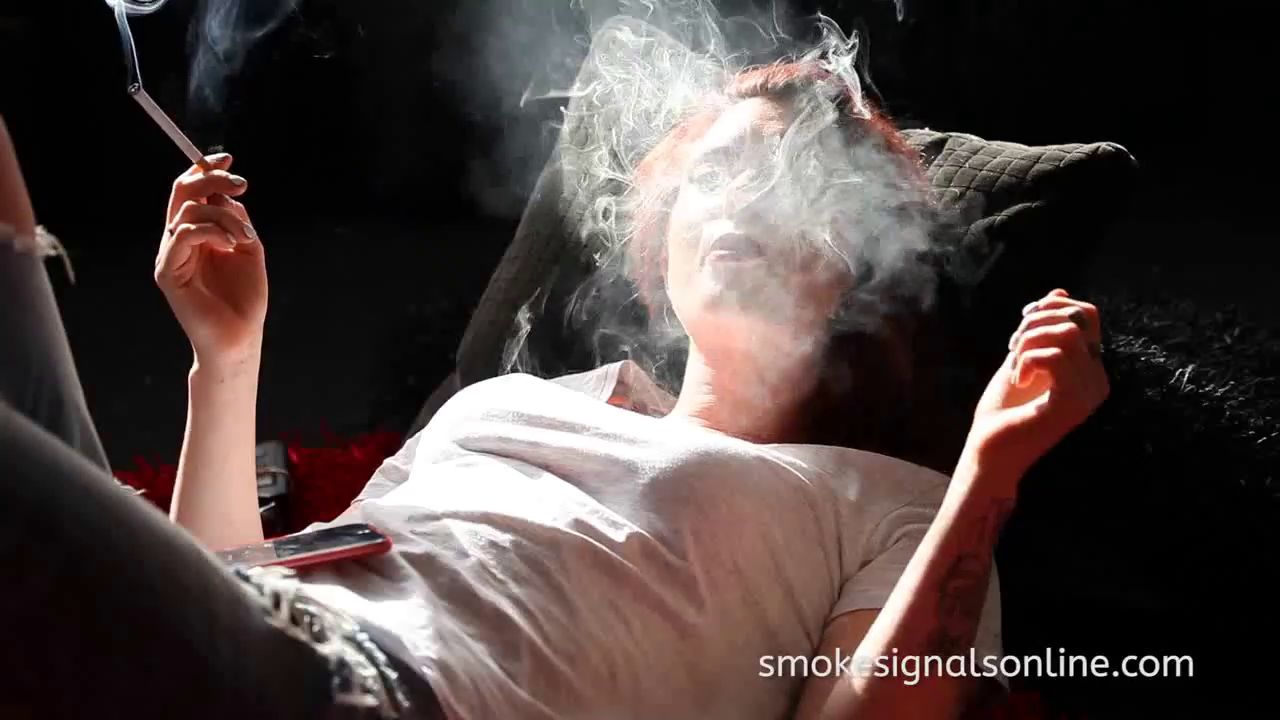 Ellie Lying Down smoking